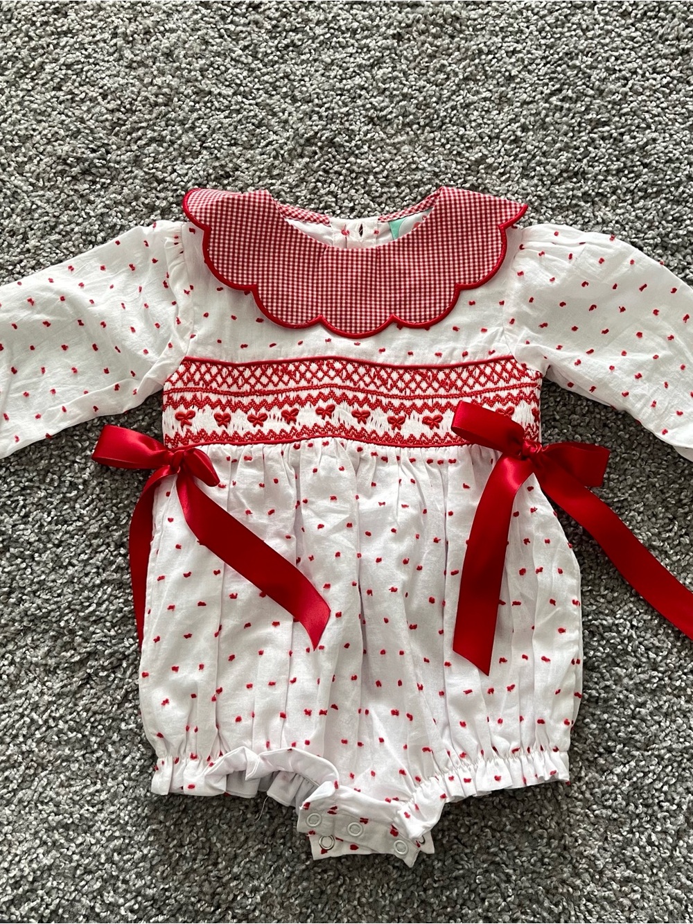 The Smocked Flamingo Smocked Hearts and Bows Red Swiss Dot Bubble